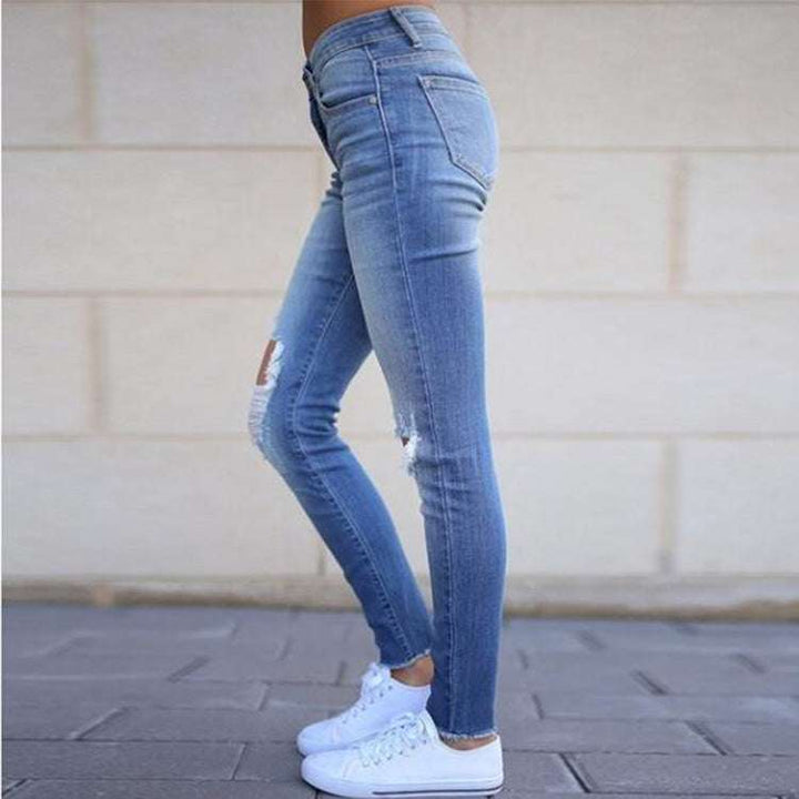 Jeans With Ripped Tassels