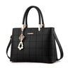 Stylish Women's Handbag with Hair Ball Detail