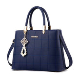 Stylish Women's Handbag with Hair Ball Detail